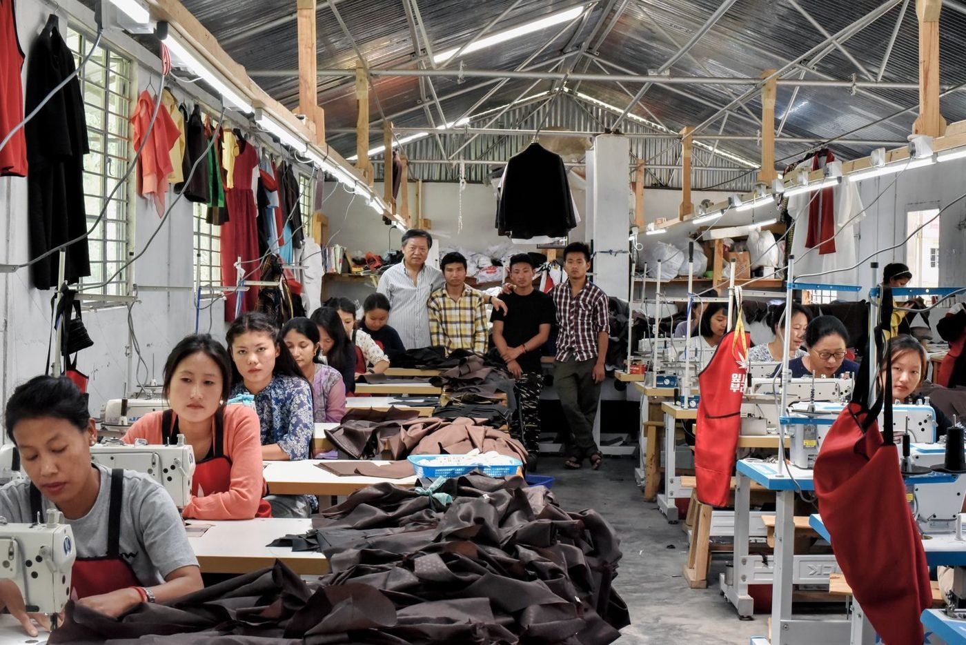 Women at sewing machines inside the Zunpha garment unit