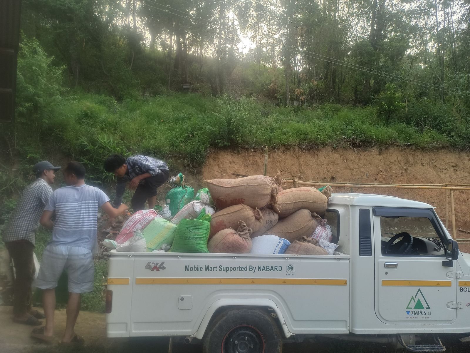 Sacks of coffee loaded on the NABARD Mobile Mart pickup